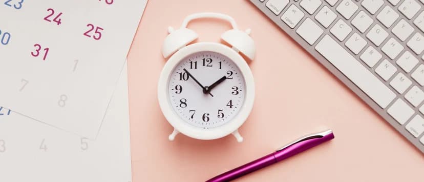 Clock, calendar and keyboard illustrating working-time planning